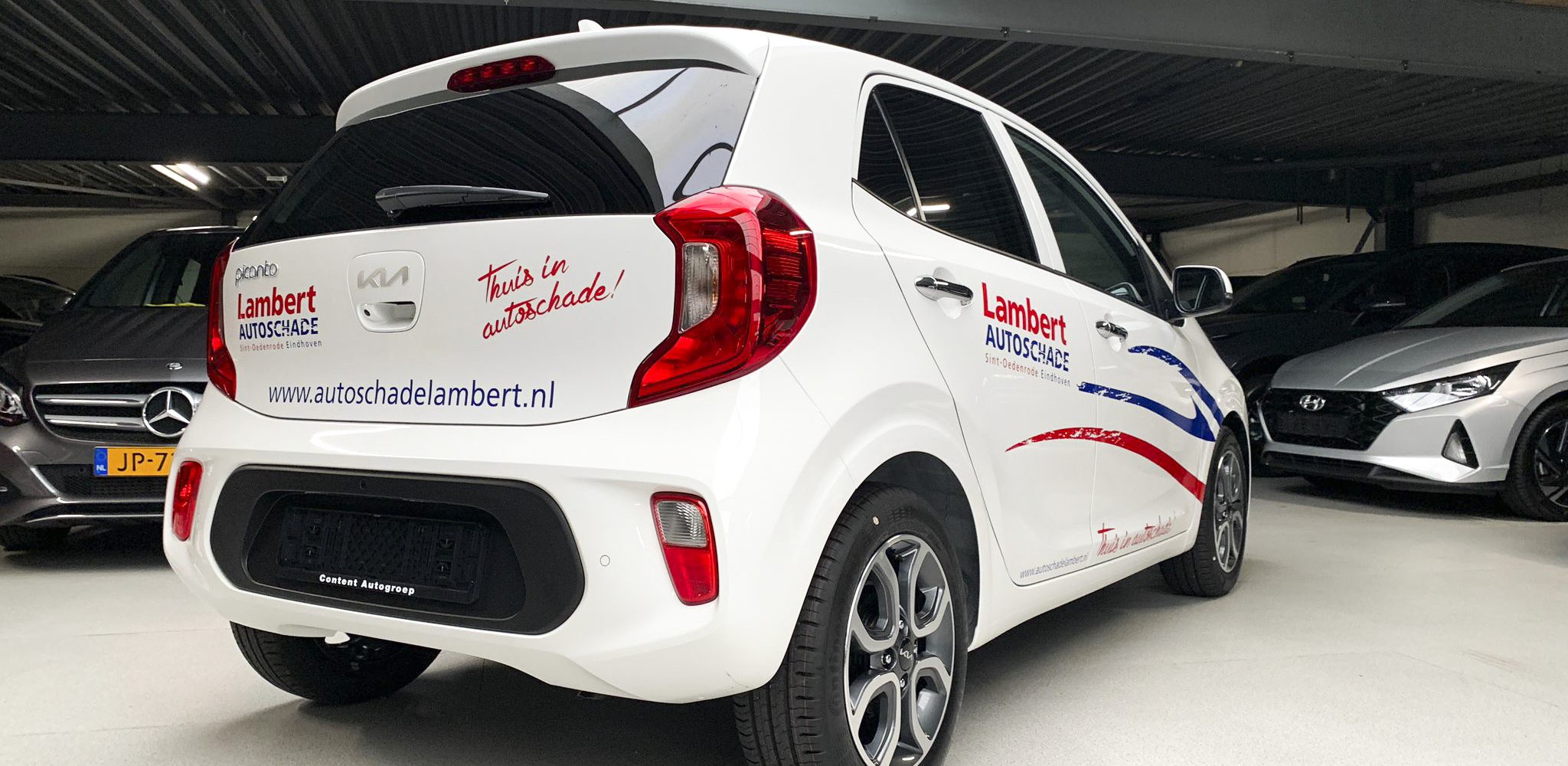 Autosticker rood met blauw voor autoschade bedrijf lambert